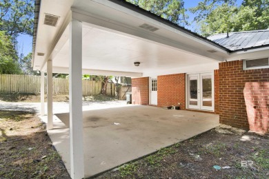 Welcome to 153 Worchester Drive, a charming single-story home on Lake Forest Yacht and Country Club in Alabama - for sale on GolfHomes.com, golf home, golf lot