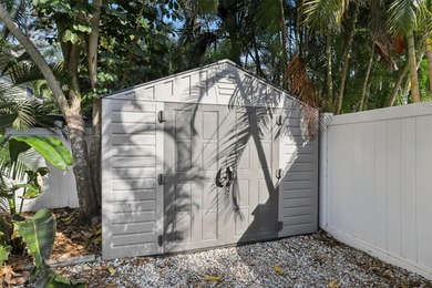 From the welcoming Key West-style front porch, step inside this on Belleair Country Club in Florida - for sale on GolfHomes.com, golf home, golf lot