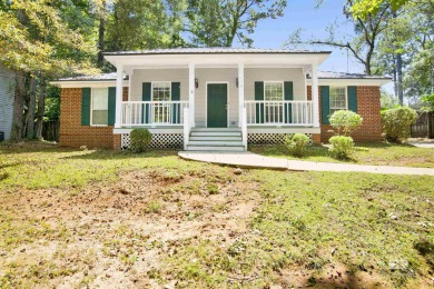Welcome to 153 Worchester Drive, a charming single-story home on Lake Forest Yacht and Country Club in Alabama - for sale on GolfHomes.com, golf home, golf lot