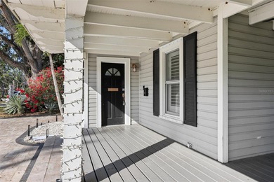 From the welcoming Key West-style front porch, step inside this on Belleair Country Club in Florida - for sale on GolfHomes.com, golf home, golf lot
