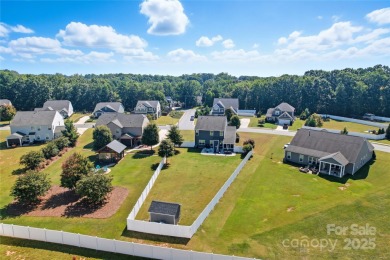 This beautifully maintained home blends comfort, style, and on Westport Golf Club in North Carolina - for sale on GolfHomes.com, golf home, golf lot