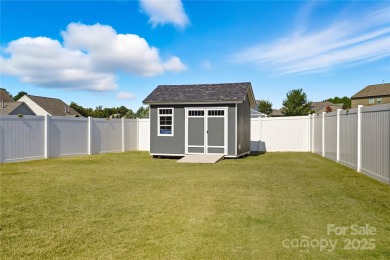 This beautifully maintained home blends comfort, style, and on Westport Golf Club in North Carolina - for sale on GolfHomes.com, golf home, golf lot