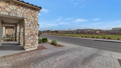 Enjoy panoramic mountain views and Phoenix skyline sunrises from on Verrado Golf Club  in Arizona - for sale on GolfHomes.com, golf home, golf lot