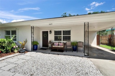 Welcome to this beautifully updated 3-bedroom, 2-bathroom on The Dunedin Country Club in Florida - for sale on GolfHomes.com, golf home, golf lot