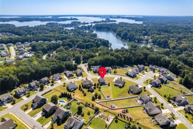 This beautifully maintained home blends comfort, style, and on Westport Golf Club in North Carolina - for sale on GolfHomes.com, golf home, golf lot