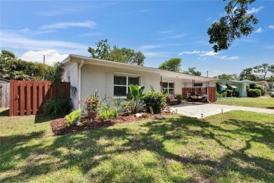 Welcome to this beautifully updated 3-bedroom, 2-bathroom on The Dunedin Country Club in Florida - for sale on GolfHomes.com, golf home, golf lot