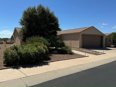 This home is in a beautiful 55+ age qualified resort community on Voyager RV Resort and Golf Course in Arizona - for sale on GolfHomes.com, golf home, golf lot