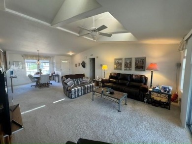 This home is in a beautiful 55+ age qualified resort community on Voyager RV Resort and Golf Course in Arizona - for sale on GolfHomes.com, golf home, golf lot