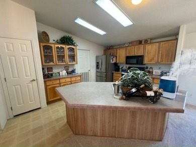 This home is in a beautiful 55+ age qualified resort community on Voyager RV Resort and Golf Course in Arizona - for sale on GolfHomes.com, golf home, golf lot