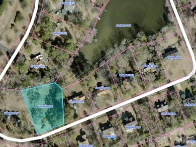 Come discover a large, beautiful mostly cleared .99 acre lot in on Rock Hill Country Club in South Carolina - for sale on GolfHomes.com, golf home, golf lot