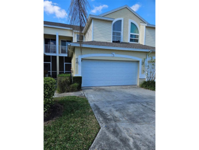 You will want to check out this beautiful town home that opens on East Bay Golf Club in Florida - for sale on GolfHomes.com, golf home, golf lot