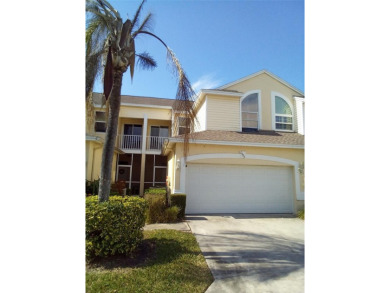 You will want to check out this beautiful town home that opens on East Bay Golf Club in Florida - for sale on GolfHomes.com, golf home, golf lot