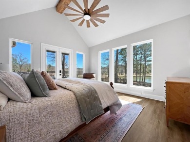 This exquisite custom home sits on the waterfront of hole #8 at on Eagles Bluff Golf Course in Texas - for sale on GolfHomes.com, golf home, golf lot