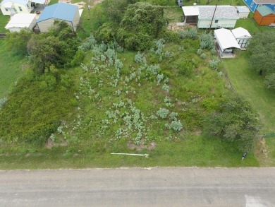 Discover this double lot (100x100) in the peaceful Holiday Beach on Lamar Golf Course in Texas - for sale on GolfHomes.com, golf home, golf lot