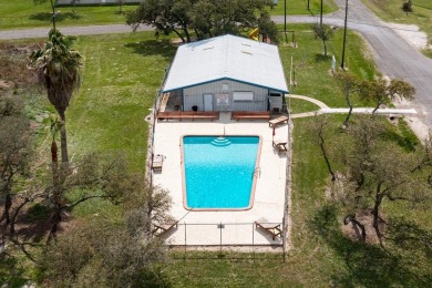 Discover this double lot (100x100) in the peaceful Holiday Beach on Lamar Golf Course in Texas - for sale on GolfHomes.com, golf home, golf lot