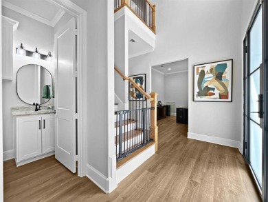 This exquisite custom home sits on the waterfront of hole #8 at on Eagles Bluff Golf Course in Texas - for sale on GolfHomes.com, golf home, golf lot