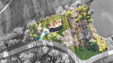 This exquisite custom home sits on the waterfront of hole #8 at on Eagles Bluff Golf Course in Texas - for sale on GolfHomes.com, golf home, golf lot
