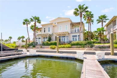 This stunning three-story waterfront residence offers 4 spacious on Palmilla Beach Golf Club in Texas - for sale on GolfHomes.com, golf home, golf lot