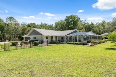 Welcome to your private oasis on a full acre in Citrus Hills! on Citrus Hills Golf Club in Florida - for sale on GolfHomes.com, golf home, golf lot