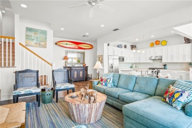 This stunning three-story waterfront residence offers 4 spacious on Palmilla Beach Golf Club in Texas - for sale on GolfHomes.com, golf home, golf lot