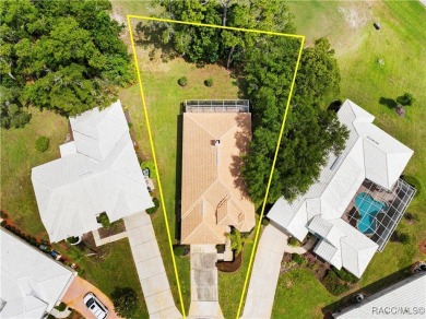 Welcome to your dream home nestled within the serene confines of on Heather Golf and Country Club in Florida - for sale on GolfHomes.com, golf home, golf lot