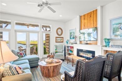 This stunning three-story waterfront residence offers 4 spacious on Palmilla Beach Golf Club in Texas - for sale on GolfHomes.com, golf home, golf lot