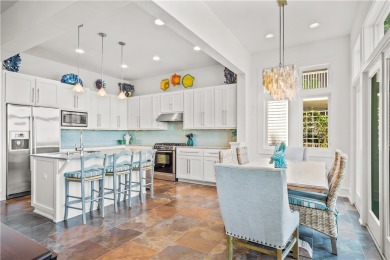 This stunning three-story waterfront residence offers 4 spacious on Palmilla Beach Golf Club in Texas - for sale on GolfHomes.com, golf home, golf lot