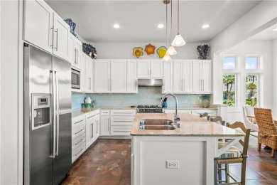 This stunning three-story waterfront residence offers 4 spacious on Palmilla Beach Golf Club in Texas - for sale on GolfHomes.com, golf home, golf lot