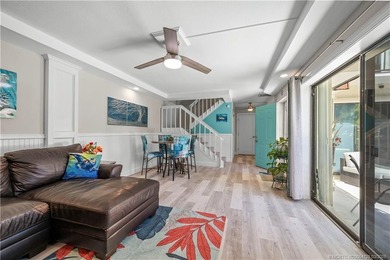 This beautifully updated coastal townhouse blends everyday on Miles Grant Country Club in Florida - for sale on GolfHomes.com, golf home, golf lot