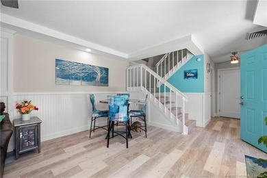 This beautifully updated coastal townhouse blends everyday on Miles Grant Country Club in Florida - for sale on GolfHomes.com, golf home, golf lot