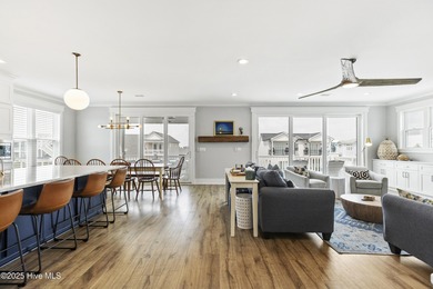 Luxurious Island Living in Sunset Beach: A Stunning 6-Bedroom, 6 on Oyster Bay Golf Links in North Carolina - for sale on GolfHomes.com, golf home, golf lot