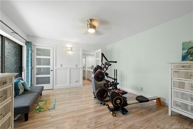 This beautifully updated coastal townhouse blends everyday on Miles Grant Country Club in Florida - for sale on GolfHomes.com, golf home, golf lot