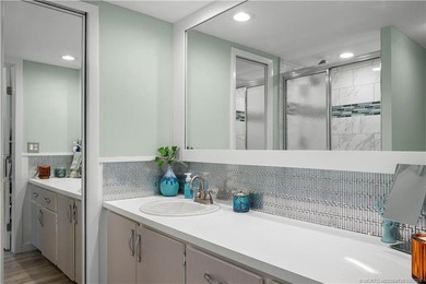 This beautifully updated coastal townhouse blends everyday on Miles Grant Country Club in Florida - for sale on GolfHomes.com, golf home, golf lot