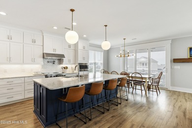 Luxurious Island Living in Sunset Beach: A Stunning 6-Bedroom, 6 on Oyster Bay Golf Links in North Carolina - for sale on GolfHomes.com, golf home, golf lot
