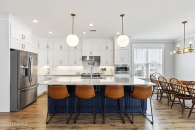 Luxurious Island Living in Sunset Beach: A Stunning 6-Bedroom, 6 on Oyster Bay Golf Links in North Carolina - for sale on GolfHomes.com, golf home, golf lot