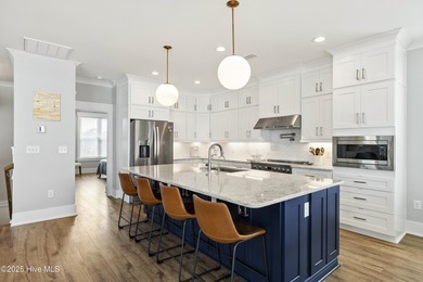 Luxurious Island Living in Sunset Beach: A Stunning 6-Bedroom, 6 on Oyster Bay Golf Links in North Carolina - for sale on GolfHomes.com, golf home, golf lot