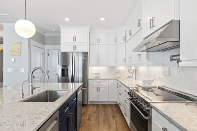 Luxurious Island Living in Sunset Beach: A Stunning 6-Bedroom, 6 on Oyster Bay Golf Links in North Carolina - for sale on GolfHomes.com, golf home, golf lot