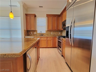 This bright and inviting condo sits on the second floor with on Reflection Bay Golf Club in Nevada - for sale on GolfHomes.com, golf home, golf lot