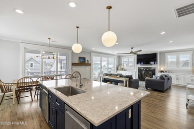 Luxurious Island Living in Sunset Beach: A Stunning 6-Bedroom, 6 on Oyster Bay Golf Links in North Carolina - for sale on GolfHomes.com, golf home, golf lot