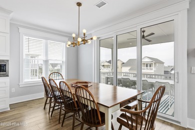 Luxurious Island Living in Sunset Beach: A Stunning 6-Bedroom, 6 on Oyster Bay Golf Links in North Carolina - for sale on GolfHomes.com, golf home, golf lot