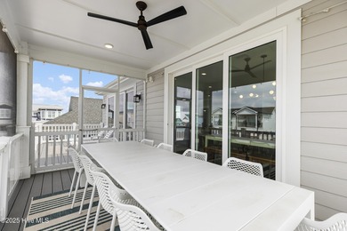 Luxurious Island Living in Sunset Beach: A Stunning 6-Bedroom, 6 on Oyster Bay Golf Links in North Carolina - for sale on GolfHomes.com, golf home, golf lot