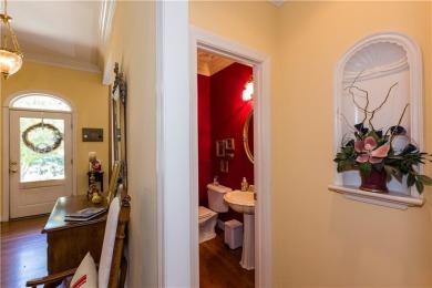 Come see this Warm and Inviting 4-side brick Luxury Home in the on Royal Lakes Golf and Country Club in Georgia - for sale on GolfHomes.com, golf home, golf lot