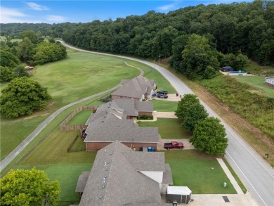 Experience refined golf course living in this stunning, fully on Big Sugar Golf Club in Arkansas - for sale on GolfHomes.com, golf home, golf lot