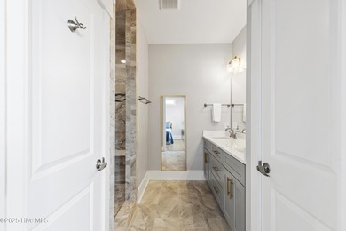 Luxurious Island Living in Sunset Beach: A Stunning 6-Bedroom, 6 on Oyster Bay Golf Links in North Carolina - for sale on GolfHomes.com, golf home, golf lot