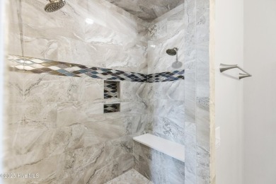 Luxurious Island Living in Sunset Beach: A Stunning 6-Bedroom, 6 on Oyster Bay Golf Links in North Carolina - for sale on GolfHomes.com, golf home, golf lot