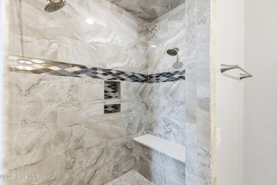 Luxurious Island Living in Sunset Beach: A Stunning 6-Bedroom, 6 on Oyster Bay Golf Links in North Carolina - for sale on GolfHomes.com, golf home, golf lot