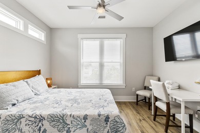 Luxurious Island Living in Sunset Beach: A Stunning 6-Bedroom, 6 on Oyster Bay Golf Links in North Carolina - for sale on GolfHomes.com, golf home, golf lot