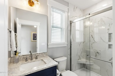 Luxurious Island Living in Sunset Beach: A Stunning 6-Bedroom, 6 on Oyster Bay Golf Links in North Carolina - for sale on GolfHomes.com, golf home, golf lot