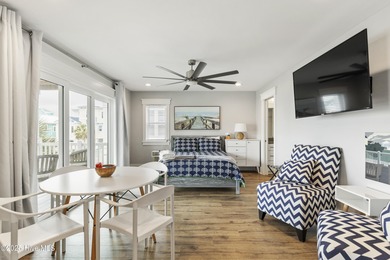 Luxurious Island Living in Sunset Beach: A Stunning 6-Bedroom, 6 on Oyster Bay Golf Links in North Carolina - for sale on GolfHomes.com, golf home, golf lot