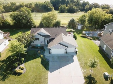 Nestled in a serene neighborhood, this meticulously maintained on Chisago Lakes Golf Course in Minnesota - for sale on GolfHomes.com, golf home, golf lot